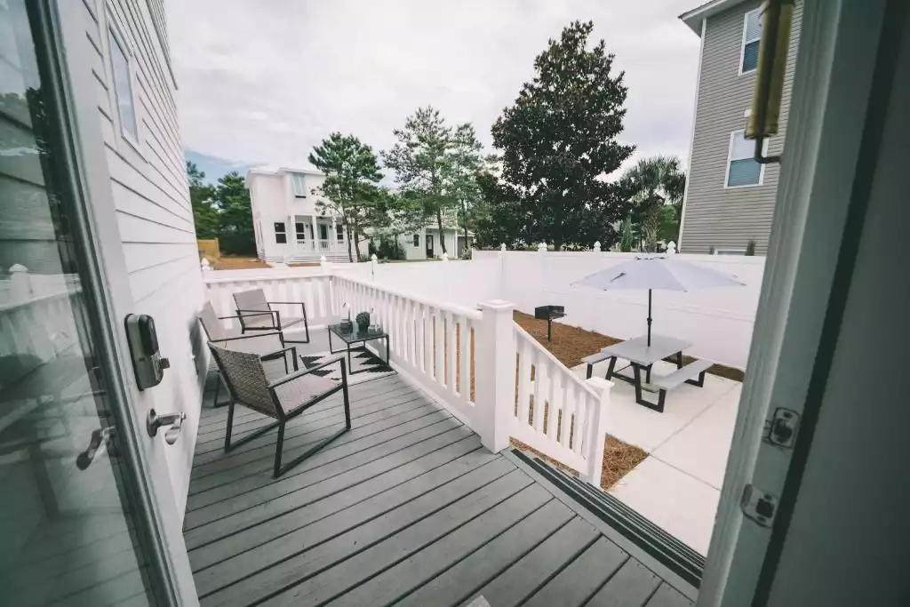 Large fenced back deck and yard