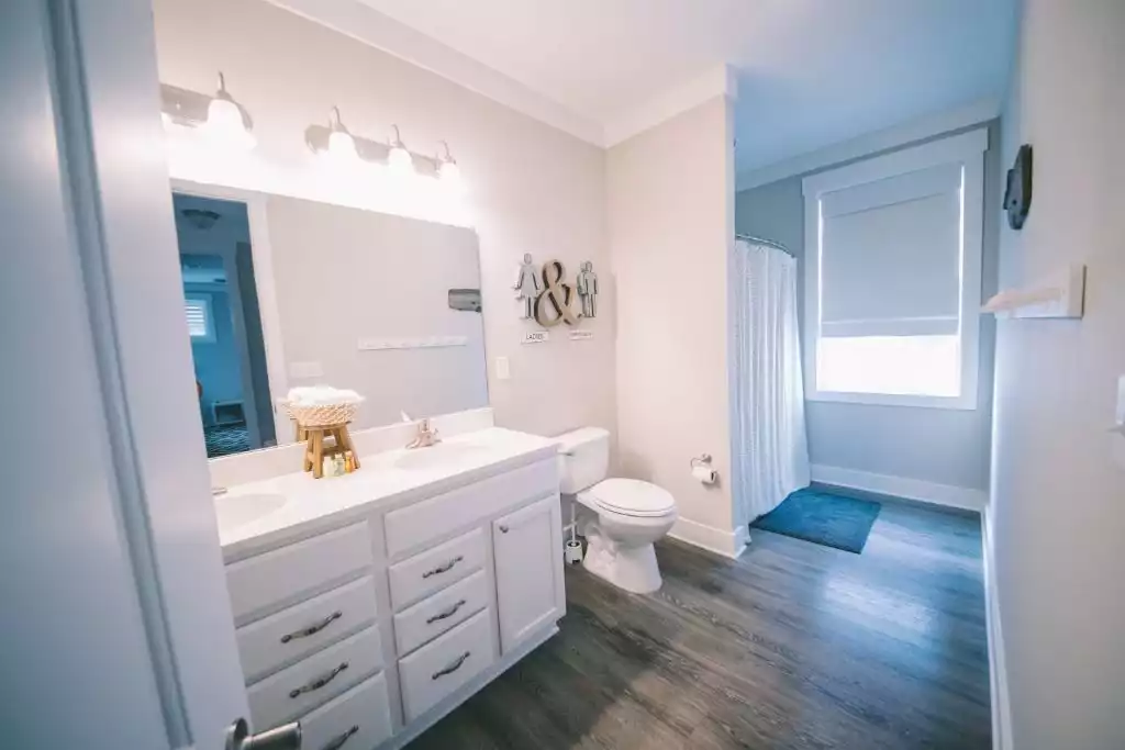 Family bath with ample storage and towel hooks